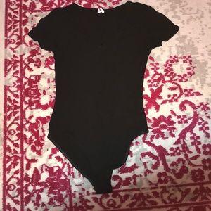 Out from under Black zip up bodysuit